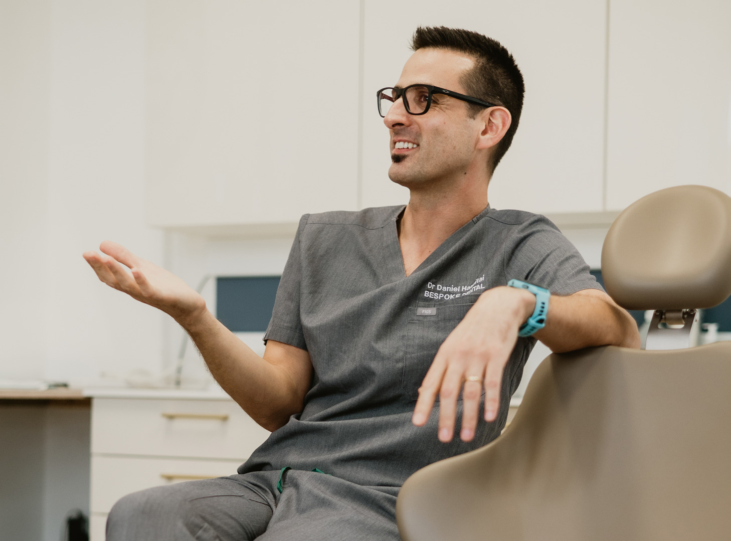 Dr Daniel Hargitai talking with a patient at Bespoke Dental, Malahide